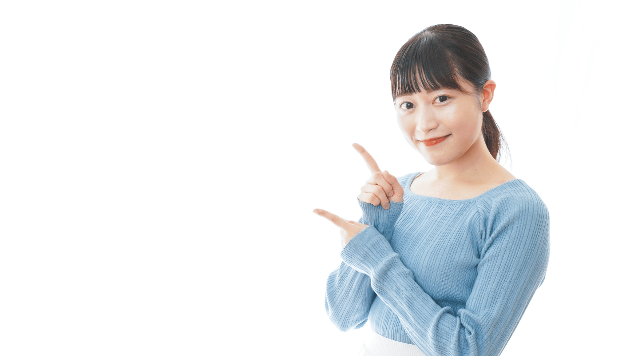 人差し指を上げてる女性